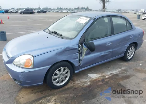 2003 Kia Rio z USA, uszkodzony, nr VIN KNADC125836279719